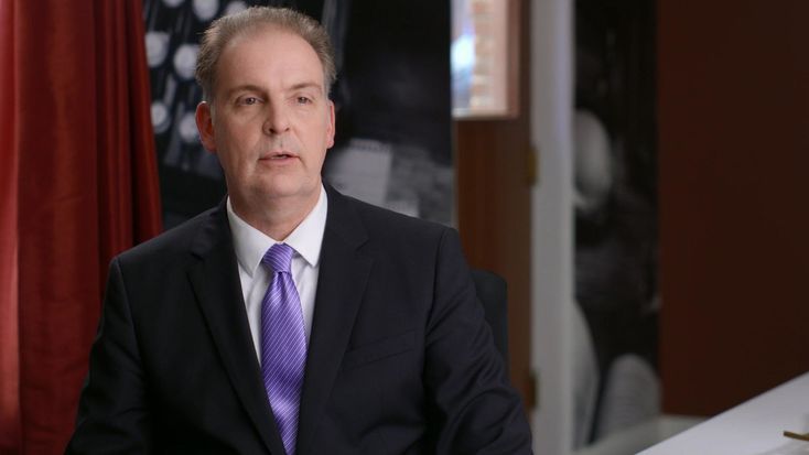 Racing Against the Clock: Henning Recalls Working “Despite” Mike Rinder